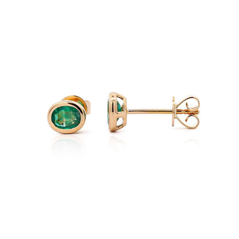 0.50 Carat Oval Emerald Bezel Set 18K Gold Stud Earrings