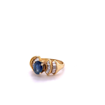 1.19 Carat Oval Cut Blue Sapphire with Baguette Cut Diamonds in 14k Gold Ring – Assay Jewelers