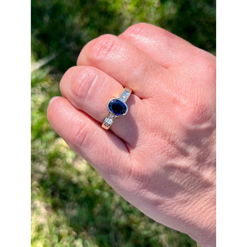 1.48 Carat Oval Cut Blue Sapphire With Princess Cut Diamond Ring in 18k Gold – Assay Jewelers
