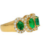 2.11 Carat Oval Cut Emerald and Diamond Wedding Band in 18K Gold