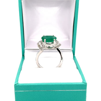 2.37 Carat Oval Cut Emerald in Retro Curved White Gold 4-Prong Ring – Assay Jewelers