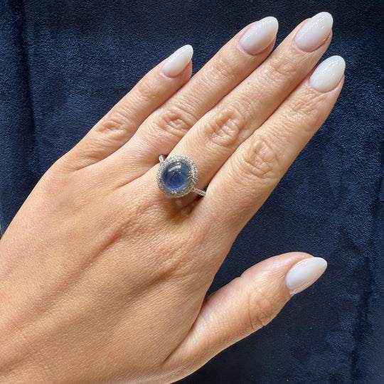 2.80 Carat Oval Cabochon Blue Star Sapphire and Diamond Halo Ring