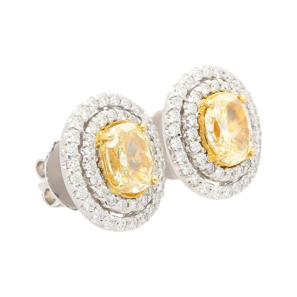 3.73 Carat TW Oval Cut Fancy Yellow Diamond Double Halo Stud Earrings