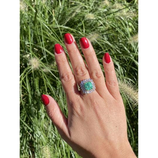 4.30 carat natural Colombian Emerald in Diamond cluster ring