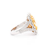 7 Carat Fancy Intense Yellow Radiant Cut Diamond and Diamond Halo Ring | GIA Certified