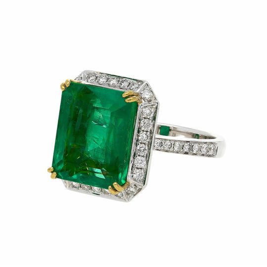 8 carat Russian Emerald in 18K White Gold Diamond Halo Ring