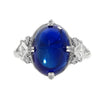 Bague en or blanc 18K sertie d'un saphir cabochon de 10,73 carats certifié AGL et de diamants