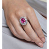 Art Deco AGL Certified No Heat 5.52 Carat Oval Cut Burma Ruby and Round Diamond Halo Ring