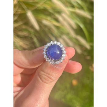 Bague halo en platine avec saphir bleu cabochon de 25 carats certifié GIA et diamants – Assay Jewelers