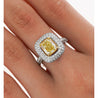 GIA Certified 2.35 Fancy Yellow Diamond Ring With 1.0 CTW Diamond Cluster in 18K White Gold