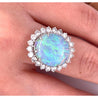 GIA Certified 4.09-carat White Opal and Diamond Halo in Platinum and Gold Ring