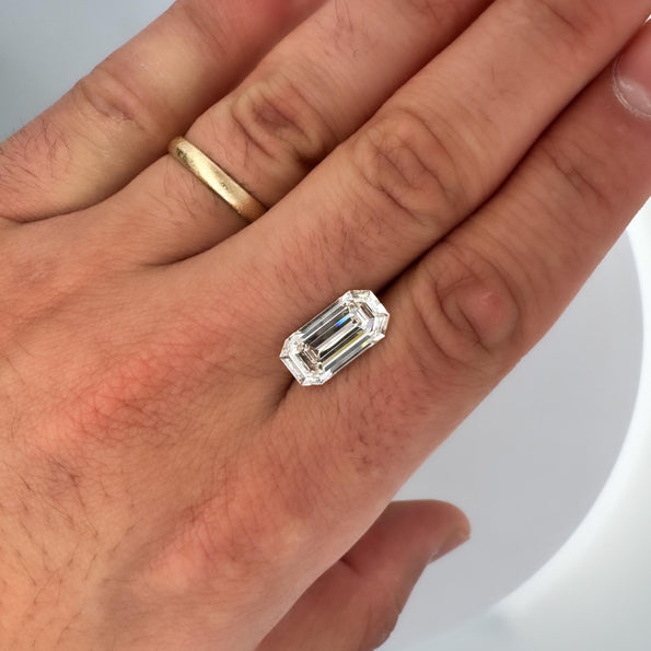 GIA Certified 5.36 Carat Emerald Cut Diamond East West Bezel Unisex Ring