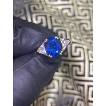 GIA Certified Oval Blue Sapphire and Trillion Diamond 3 Stone Ring in 18K – Assay Jewelers