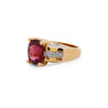 GIA Certified Oval Cut 7 Carat Purplish Red Tourmaline Ring with Diamond Sides in 18K Gold