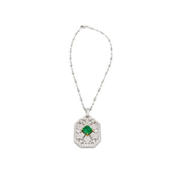 Vintage Carved Platinum 3.16 Carat Vivid Green Minor Oil Emerald Pendant with 4 CTTW in Diamonds – Assay Jewelers