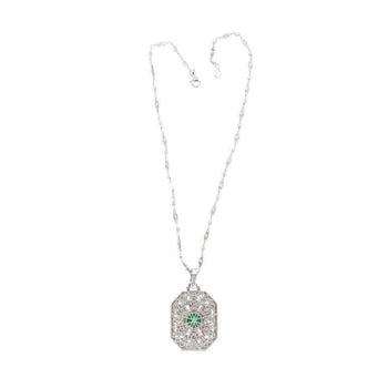Vintage Carved Platinum 3.16 Carat Vivid Green Minor Oil Emerald Pendant with 4 CTTW in Diamonds – Assay Jewelers