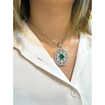 Vintage Carved Platinum 3.16 Carat Vivid Green Minor Oil Emerald Pendant with 4 CTTW in Diamonds – Assay Jewelers