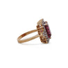 Vivid Pink 7 Carat Radiant Cut Tourmaline Ring with Round Diamond Halo in 18K Gold